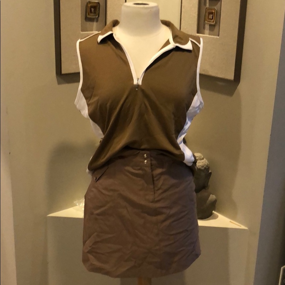 IZOD VINTAGE   NWOT  TOP AND SKORT  SET.